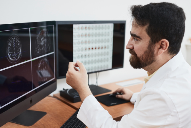 researcher looking at computer