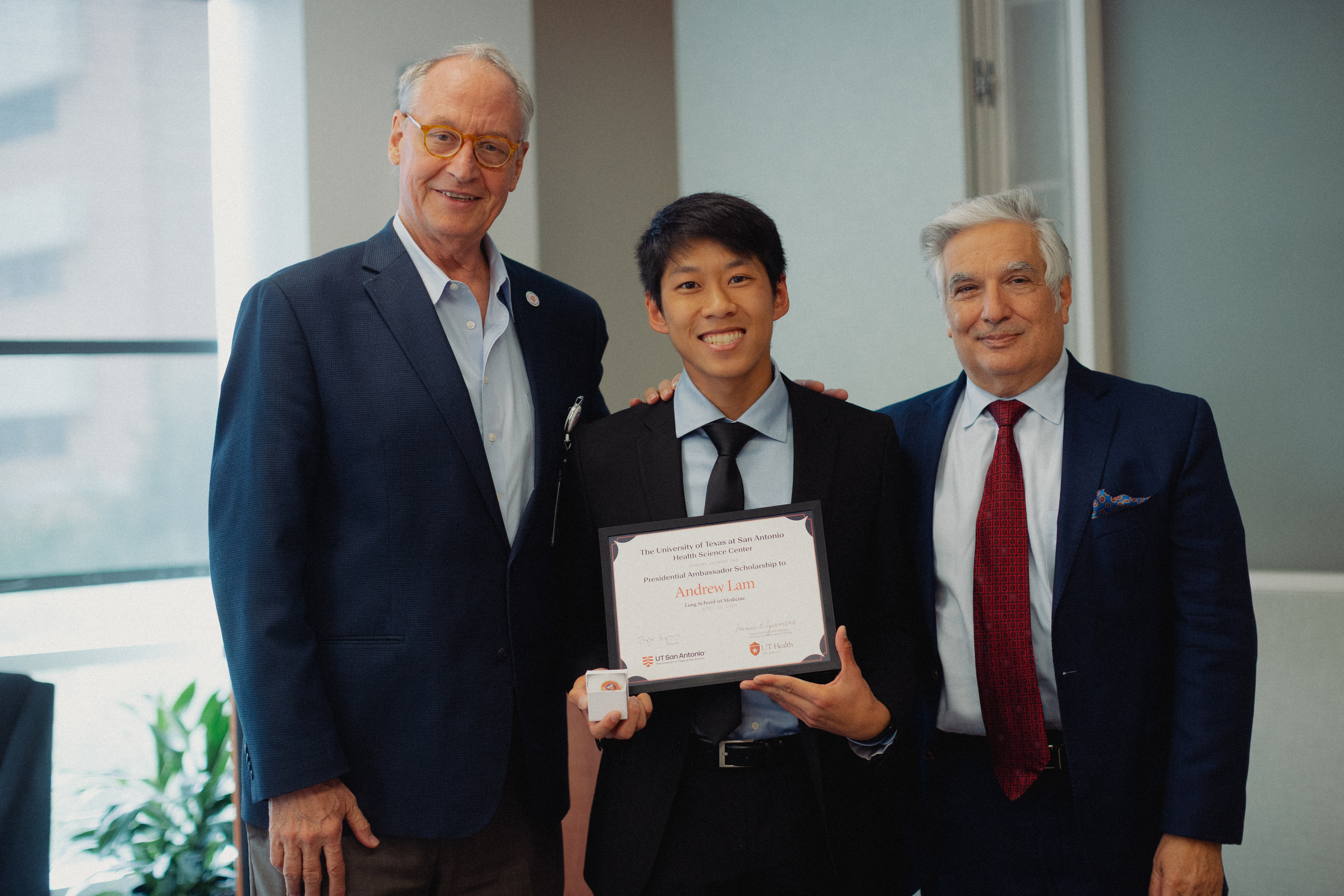 Taylor Eighmy, PhD, President, UT San Antonio, Andrew Lam, Joe R. and Teresa Lozano Long School of Medicine Presidential Ambassador scholarship recipient, and Francisco G. Cigarroa, MD Senior Executive Vice President for Health Affairs and Health System 