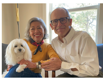 Family photo of Jim Kilgore with wife Rachel and their family dog. 